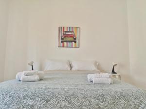 Postel nebo postele na pokoji v ubytování Guest House Service - Modugno
