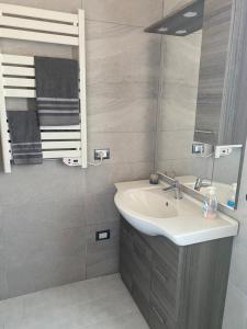 Ванная комната в La Villa dell Artista con vista mare e dune - IUN Q7440
