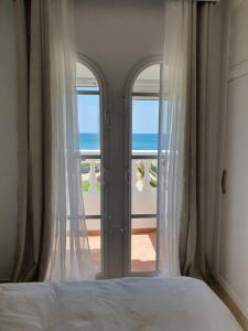 Postel nebo postele na pokoji v ubytování Aldea beach, manilva + 49 fotografií