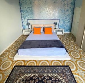 A bed or beds in a room at La Valle dei Vigher