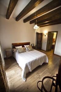 Postel nebo postele na pokoji v ubytování Posada Real del Buen Camino