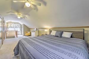 Una cama o camas en una habitación de Granby Getaway in the Woods with Spacious Yard!