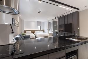 Kuchyň nebo kuchyňský kout v ubytování House Apartment