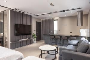 TV a/nebo společenská místnost v ubytování House Apartment