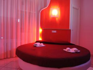 Postel nebo postele na pokoji v ubytování Minihotel IRIS
