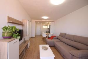 A seating area at Apartment Discover Las Americas