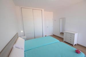 A bed or beds in a room at Apartment Discover Las Americas