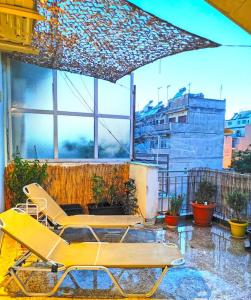 Balkón alebo terasa v ubytovaní Koukaki sunshine roof apartment