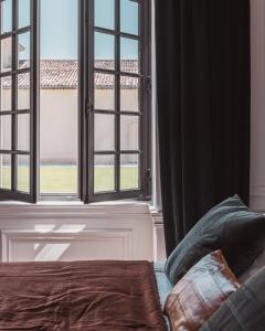 Château Laffitte Carcasset客房内的一张或多张床位