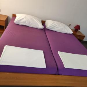 Postel nebo postele na pokoji v ubytování Guest House Vukušić + 24 fotografií