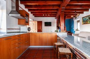 Kuchyň nebo kuchyňský kout v ubytování Apartamento turístico tapia 2 + 14 fotografií