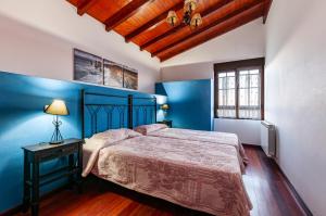 Postel nebo postele na pokoji v ubytování Apartamento turístico tapia 2