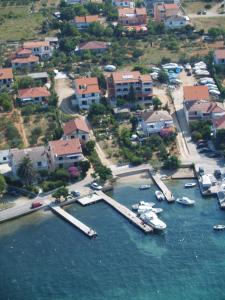 an aerial view of a harbor with boats in the water at Bed and breakfast Nika in Rab