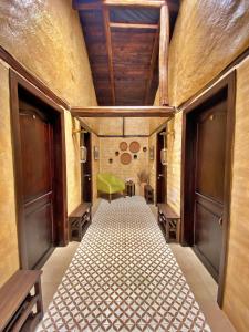 Voodi või voodid majutusasutuse Chilcabamba Lodge toas