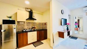 A cozinha ou kitchenette de Olive Service Apartments Gachibowli