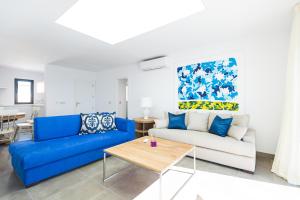 Posezení v ubytování Altos de la Gloria Beach Apartments