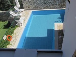 Bazén v ubytování Harmony Villas nebo v jeho okolí