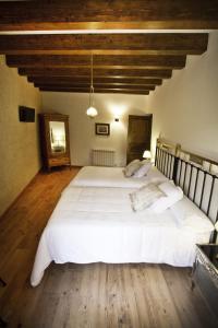 Postel nebo postele na pokoji v ubytování Posada Real del Buen Camino