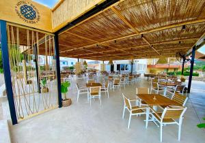 Reštaurácia alebo iné gastronomické zariadenie v ubytovaní Zoom Beach Hotel