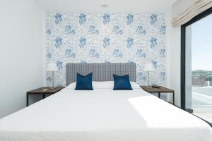 Postel nebo postele na pokoji v ubytování Altos de la Gloria Beach Apartments