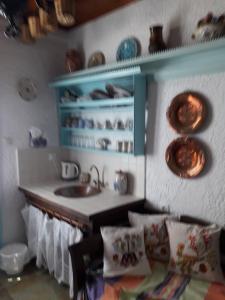 Kuchyňa alebo kuchynka v ubytovaní Nyfes Traditional Boutique Frosyni