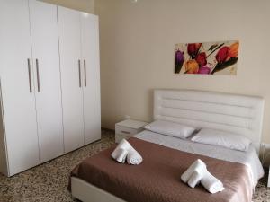 Postel nebo postele na pokoji v ubytování Casetta del Lettore