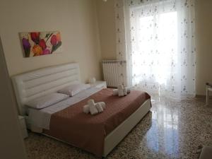 Postel nebo postele na pokoji v ubytování Casetta del Lettore
