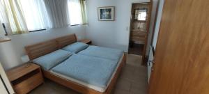 Postel nebo postele na pokoji v ubytování Apartment Hüttner