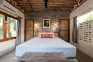 Postel nebo postele na pokoji v ubytování Casa Coyote Tulum