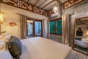 Postel nebo postele na pokoji v ubytování Casa Coyote Tulum