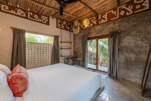 Postel nebo postele na pokoji v ubytování Casa Coyote Tulum