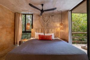 Postel nebo postele na pokoji v ubytování Casa Coyote Tulum