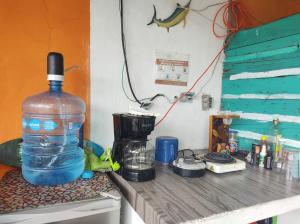 a large bottle of water sitting on top of a counter at Sustainable Cabain in Cozumel