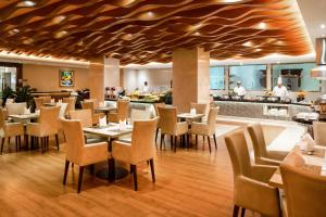 En restaurang eller annat matställe på Holiday Inn Macau, an IHG Hotel