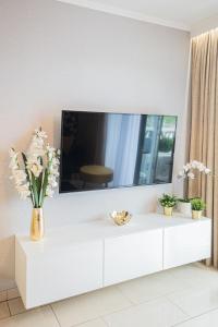 Et tv og/eller underholdning på Apartament 55m2 - Darmowy Garaż - Klimatyzacja - Centrum - 24na7