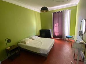 Posteľ alebo postele v izbe v ubytovaní SETE : Hyper centre piéton Haussmannien 2