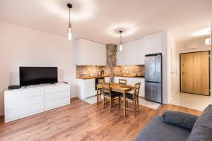 Kuchyňa alebo kuchynka v ubytovaní Saska Kępa Bright Apartament