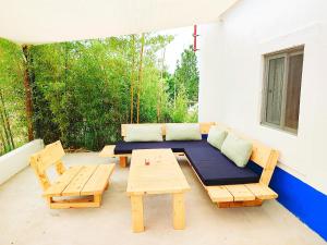 Χώρος καθιστικού στο Be a Guest at PachaMama Community