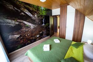 Postel nebo postele na pokoji v ubytování Chaty Ferrata