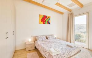 Ένα ή περισσότερα κρεβάτια σε δωμάτιο στο Casa Alina