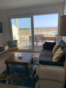 Χώρος καθιστικού στο Bel Appartement 11 au rez chaussée vue mer au Maeva