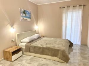 Posteľ alebo postele v izbe v ubytovaní Apartments NANA