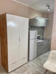 Kuchyňa alebo kuchynka v ubytovaní Apartments NANA