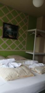 Letto o letti in una camera di Det Gamle Hotel Rudkøbing