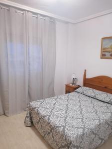 Posteľ alebo postele v izbe v ubytovaní Schöne Ferienwohnung in Playa del Cura