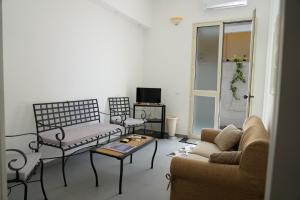 A seating area at L'Albero bello Holiday