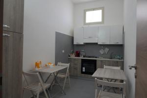A kitchen or kitchenette at L'Albero bello Holiday