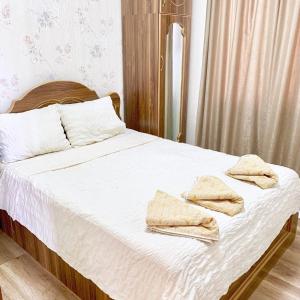 Postel nebo postele na pokoji v ubytování Tskaltubo village - nature resort