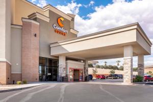 a commercial building with a car dealership at Comfort Suites St George - University Area in St. George