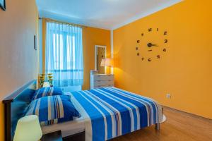 Ένα ή περισσότερα κρεβάτια σε δωμάτιο στο Apartman Milla
